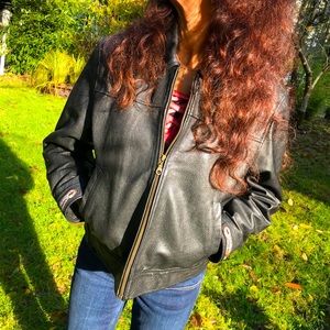 Black leather jacket with Harley-Davidson appliqué